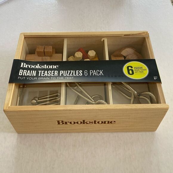 BROOKSTONE Brain Teaser Puzzles 6 Pack NWOT - Picture 1 of 6